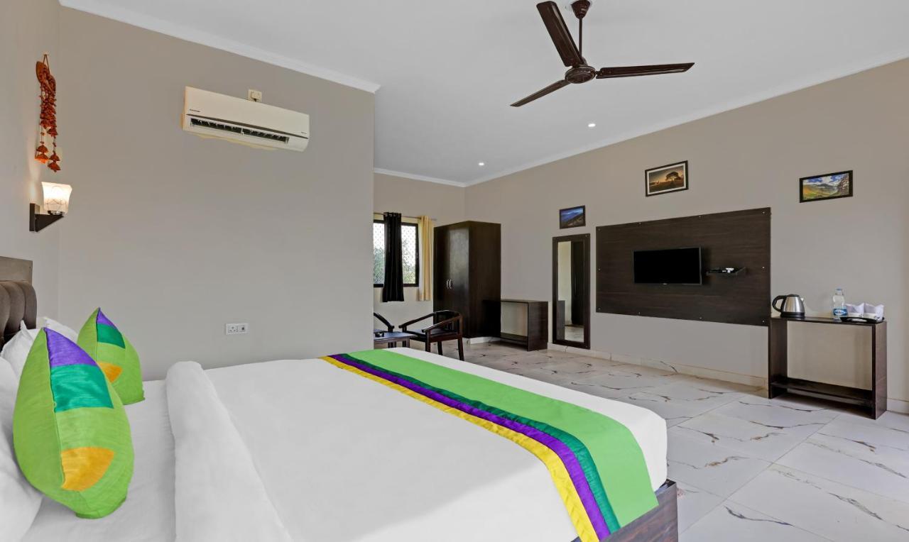 Treebo Kaira With Pool View, 5 Km From Jim Corbett Jungle Safari Hotel Ramnagar (Uttarakhand)